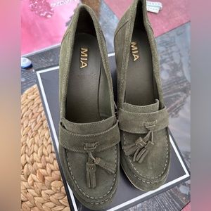 Women’s suede loafers.